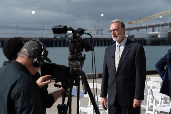 acec member talking in front of the camera during interview