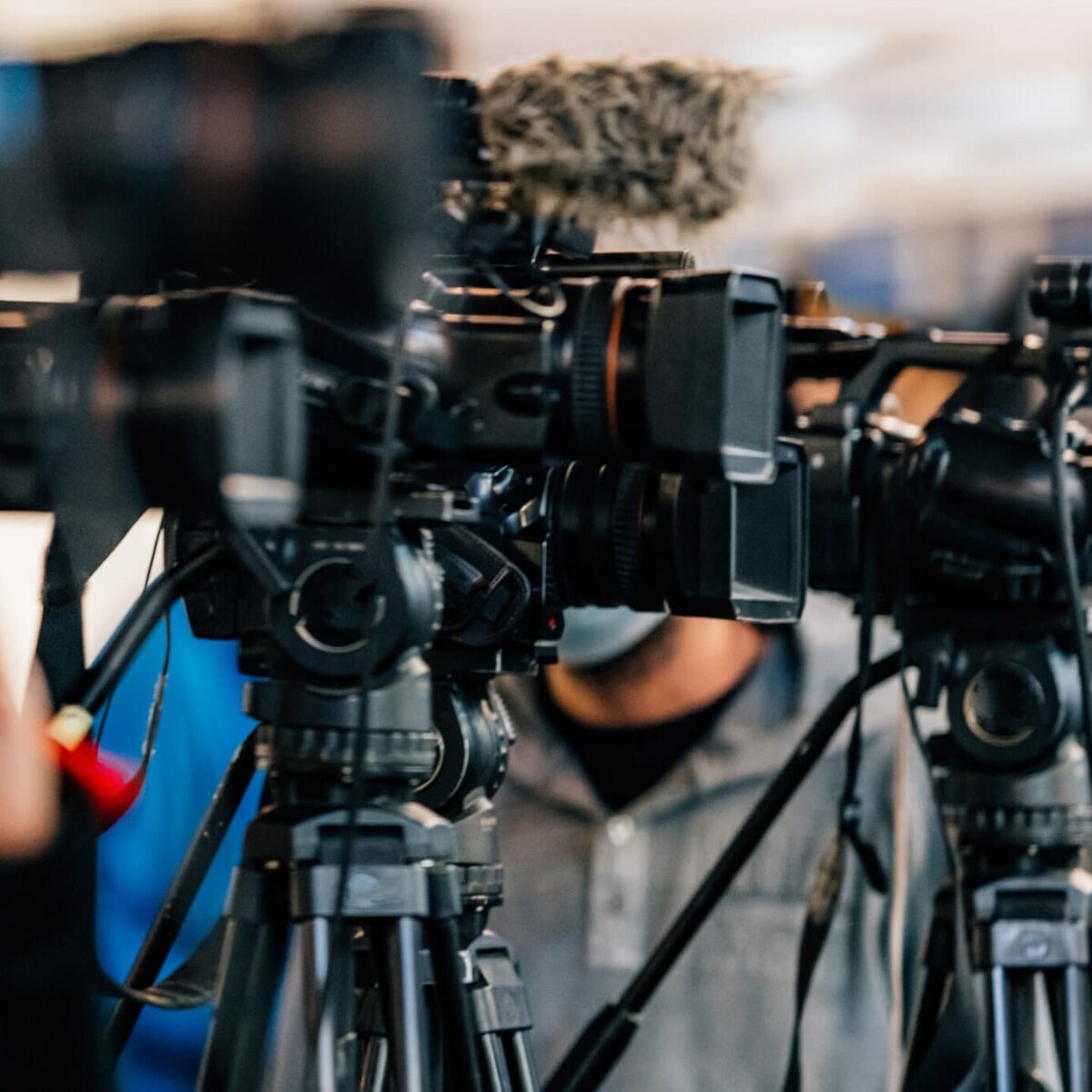 Cameras at a Live Media Conference.