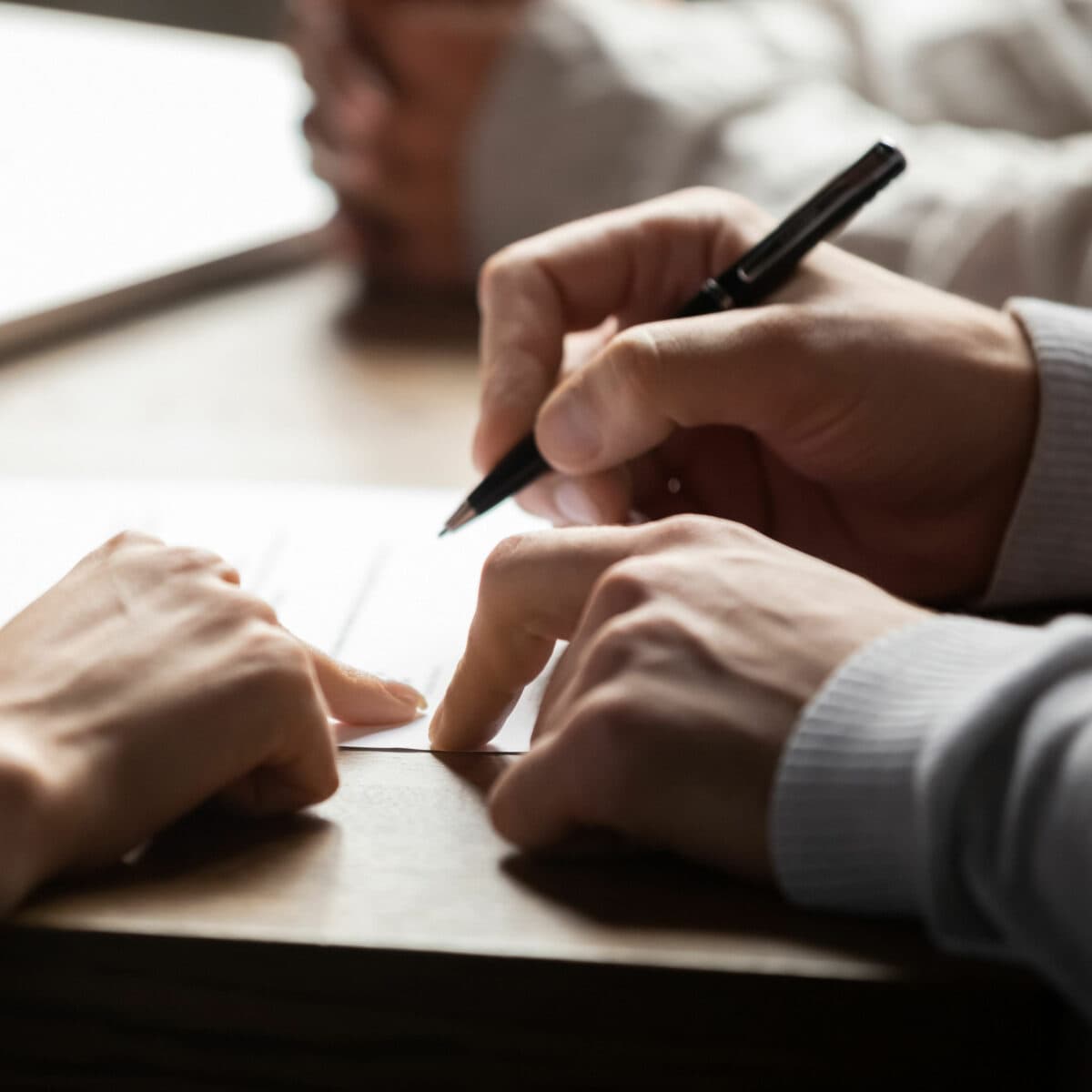 Man signing a contract