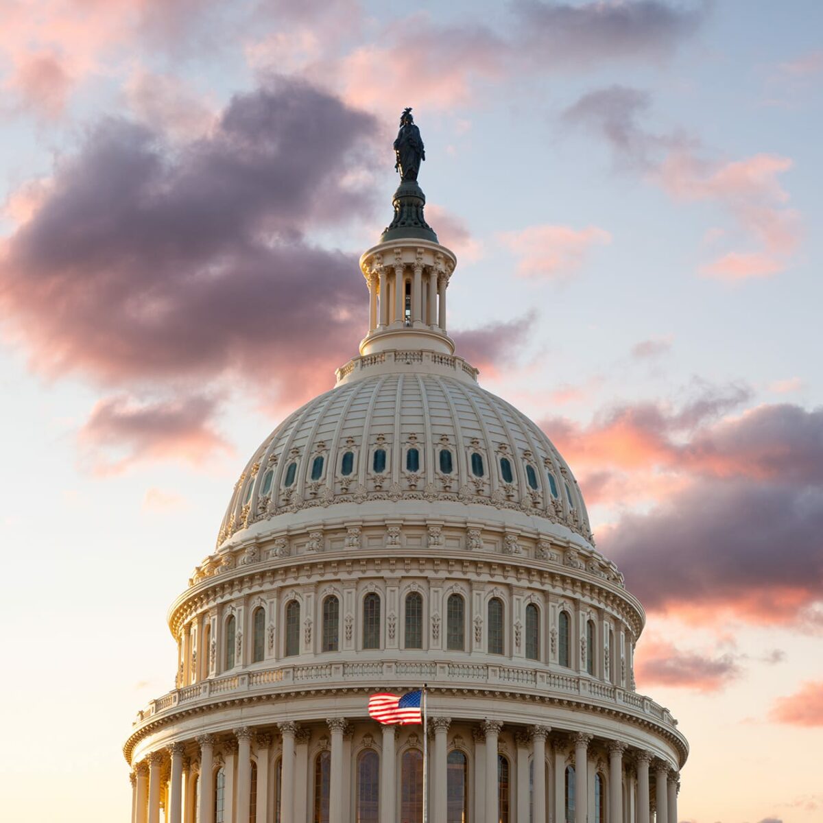 us-flag-flies-front-us-capitol-washington-dc-as-sun-rises-dawn-new-day